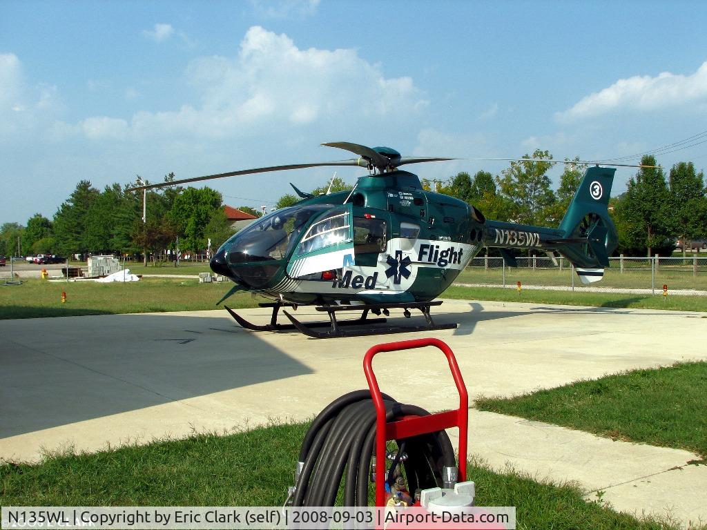 N135WL, 2004 Eurocopter EC-135P-2 C/N 0329, N135WL gets a little post flight attention after landing at Wellston, Ohio.