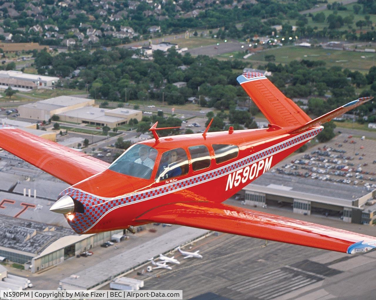 N590PM, 1969 Beech V35A Bonanza C/N D-8909, over Beechcraft Factory 2002