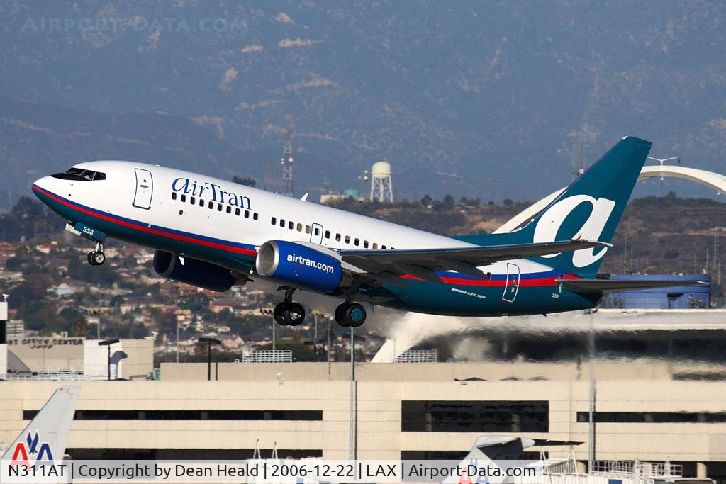 N311AT, 2006 Boeing 737-7BD C/N 33930, AirTran Airways N311AT (FLT TRS56) climbing out from RWY 25R enroute to Hartsfield-Jackson Atlanta Int'l (KATL).