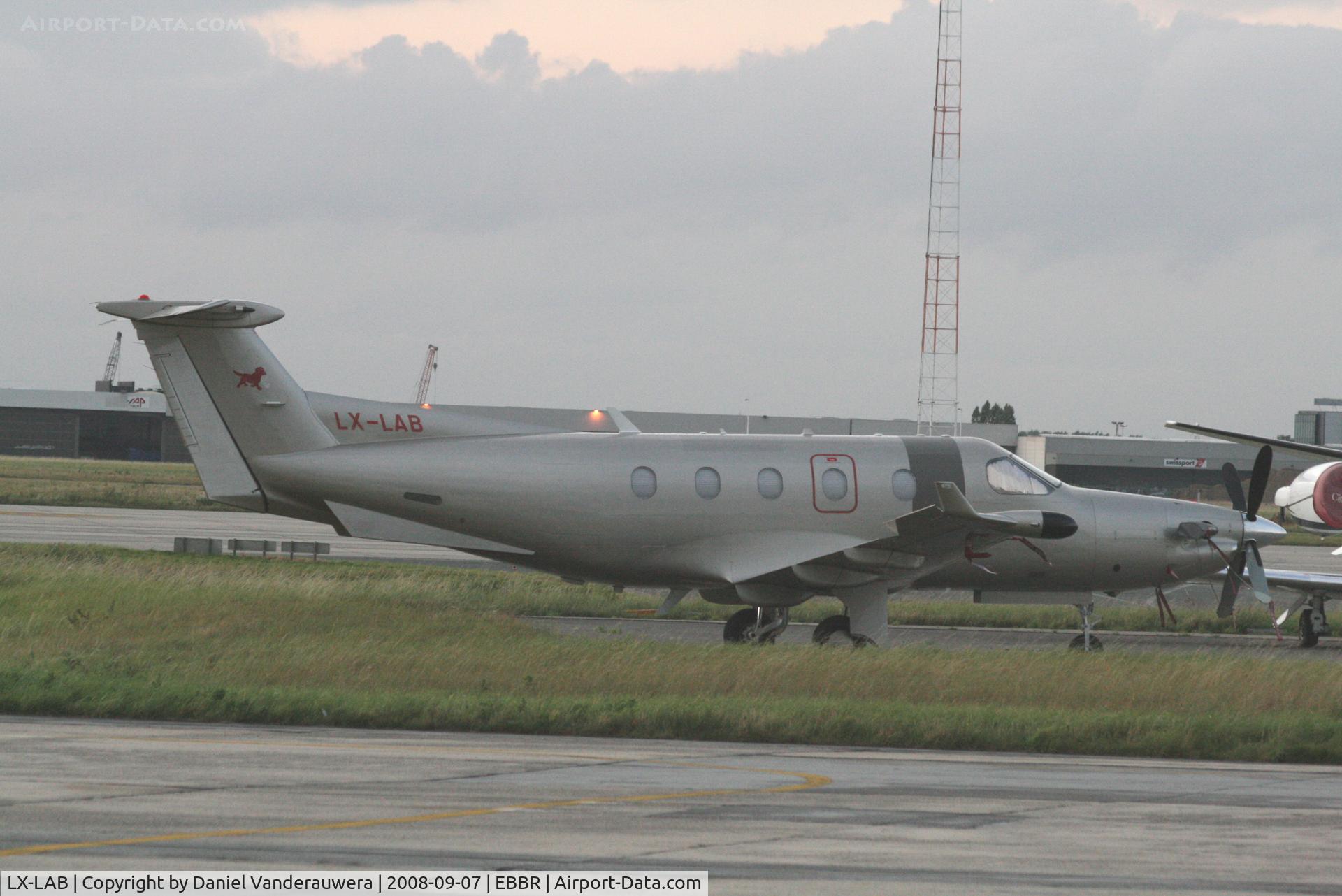 LX-LAB, 2003 Pilatus PC-12/45 C/N 531, parked on General Aviation apron (Abelag) - end of a cloudy day