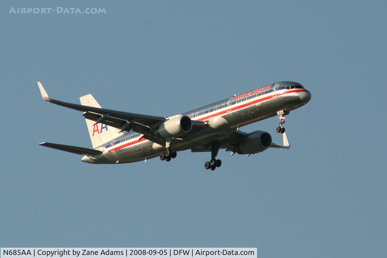 N685AA, 1992 Boeing 757-223 C/N 25342, Landing 13R at DFW - taken from Southlake Carrol High School football stadium during the Friday night game.