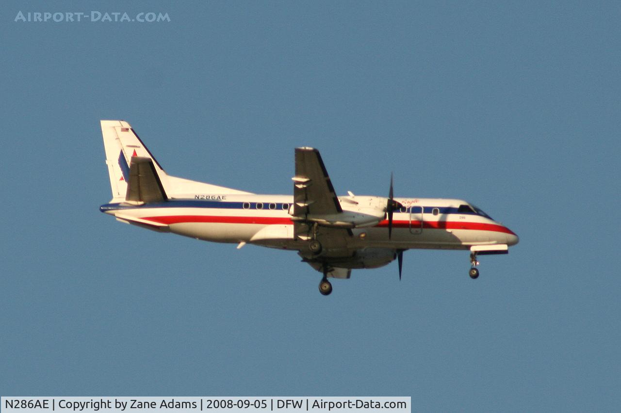 N286AE, 1992 Saab 340B C/N 340B-286, Landing 13R at DFW - taken from Southlake Carrol High School football stadium during the Friday night game.