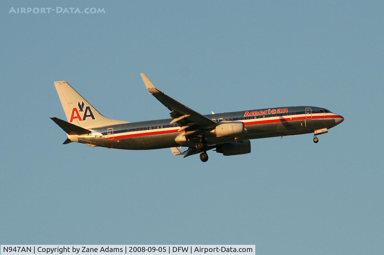 N947AN, 2000 Boeing 737-823 C/N 29536, Landing 13R at DFW - taken from Southlake Carrol High School football stadium during the Friday night game.