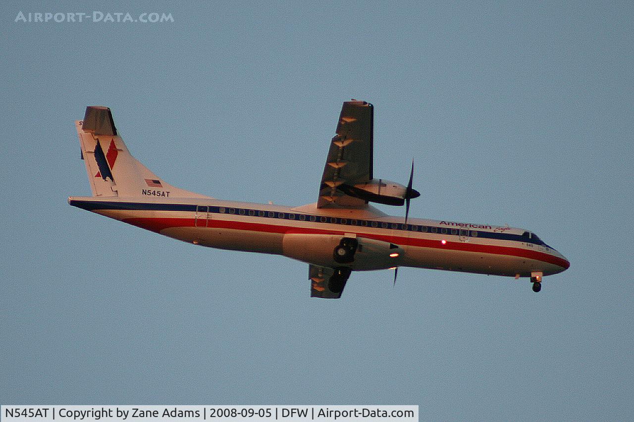 N545AT, 1998 ATR 72-212A C/N 545, Landing 13R at DFW - taken from Southlake Carrol High School football stadium during the Friday night game.