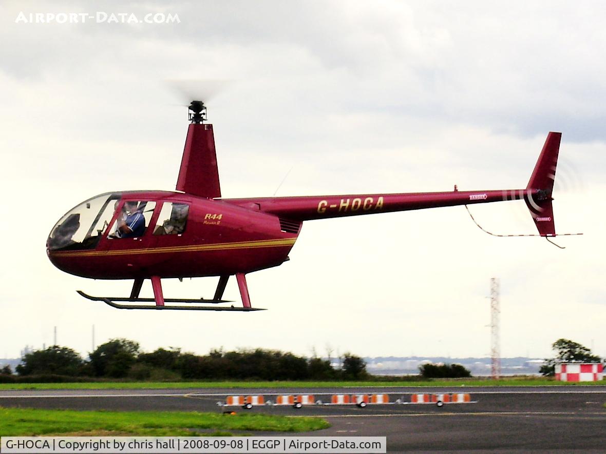 G-HOCA, 2008 Robinson R44 Raven II C/N 12388, departing with EI-WWI