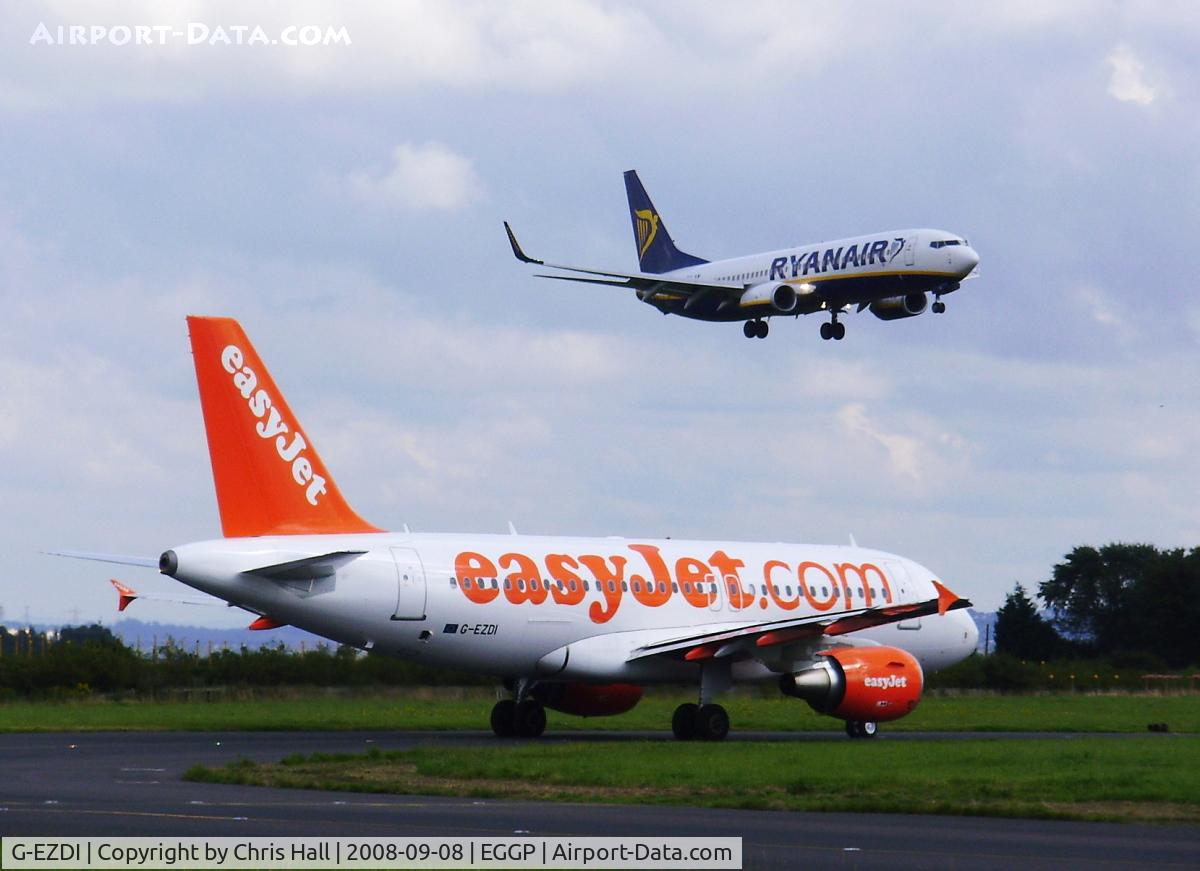 G-EZDI, 2008 Airbus A319-111 C/N 3537, easyJet Airbus on hold as EI-DAN Ryanair B737-8AS comes in to land