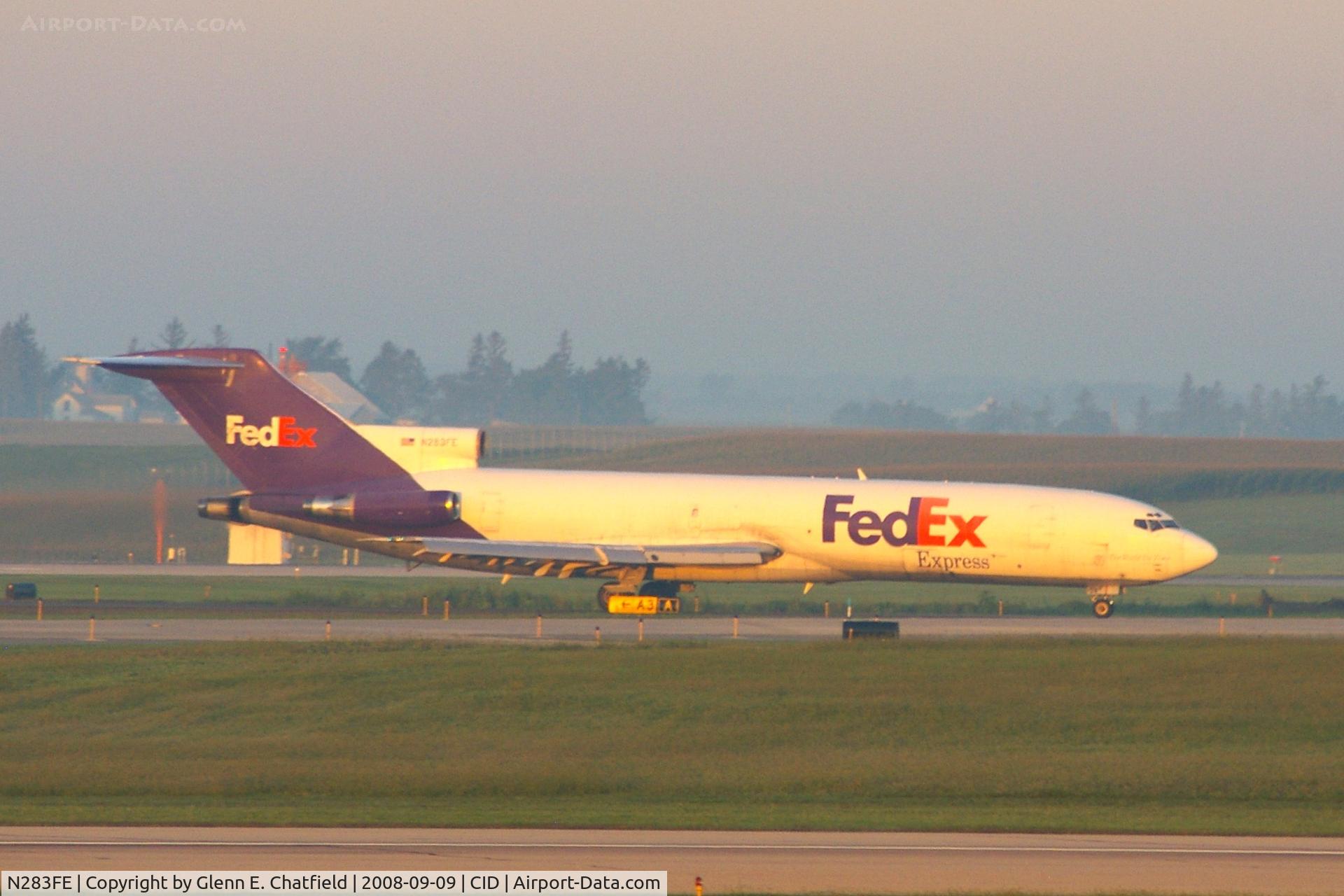 N283FE, 1981 Boeing 727-233F C/N 22350, Turning off Runway 27 just after sunrise.