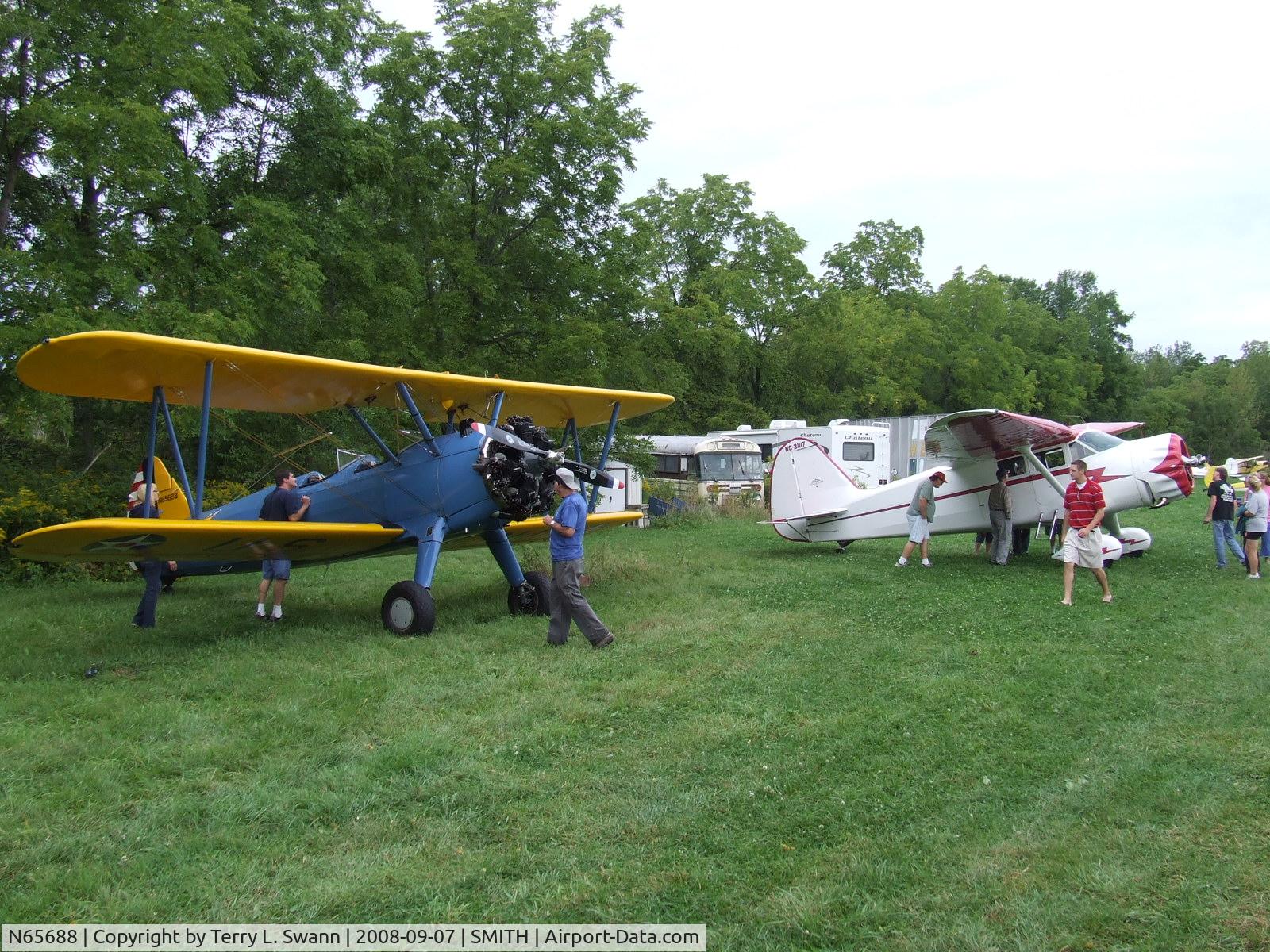 N65688, Boeing E75 C/N 75-8469, Scott's Stearman and his brother Mark's Stinson SR-9C at Smith Field Fly-In Breakfast.
