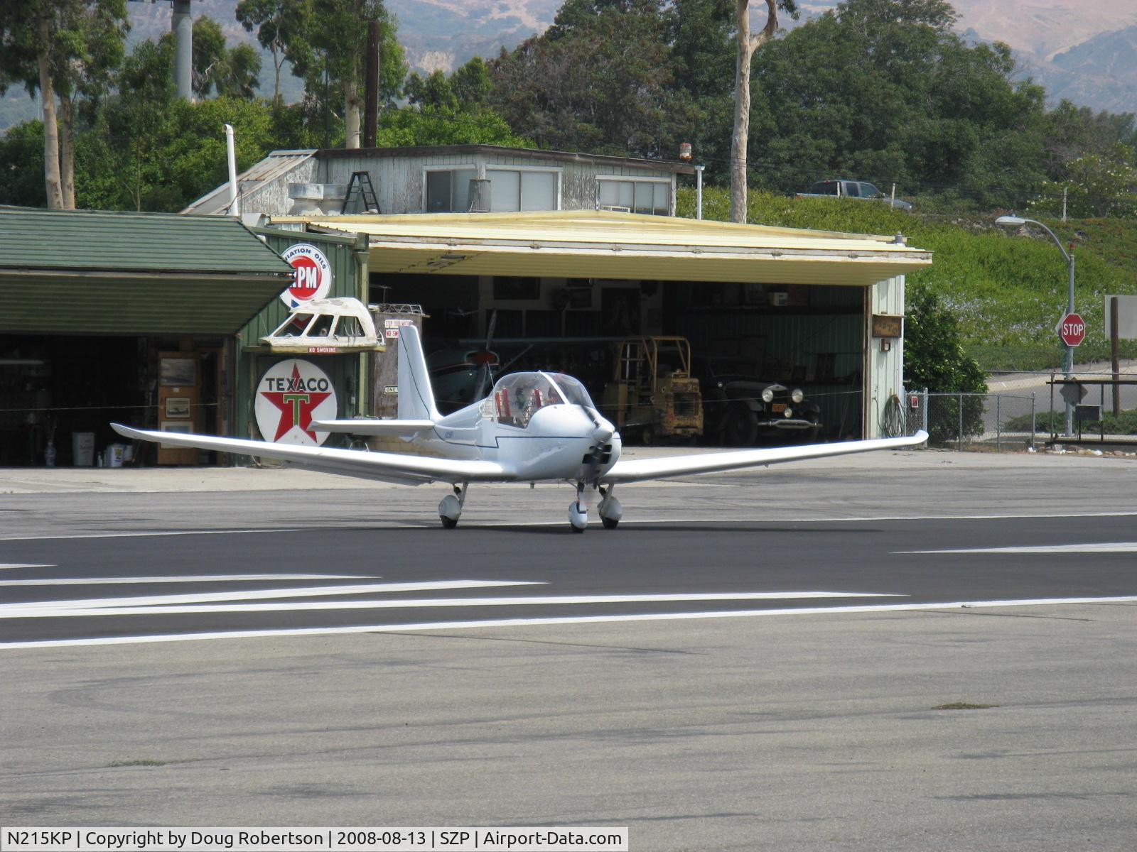 N215KP, 2005 Jihlavan KP-5 C/N 5111129K, 2005 Jihlavan Sro KAPPA KP-5, Rotax 912S 100 Hp, taking the active. The green ex-Steve McQueen hangar/home to left behind.