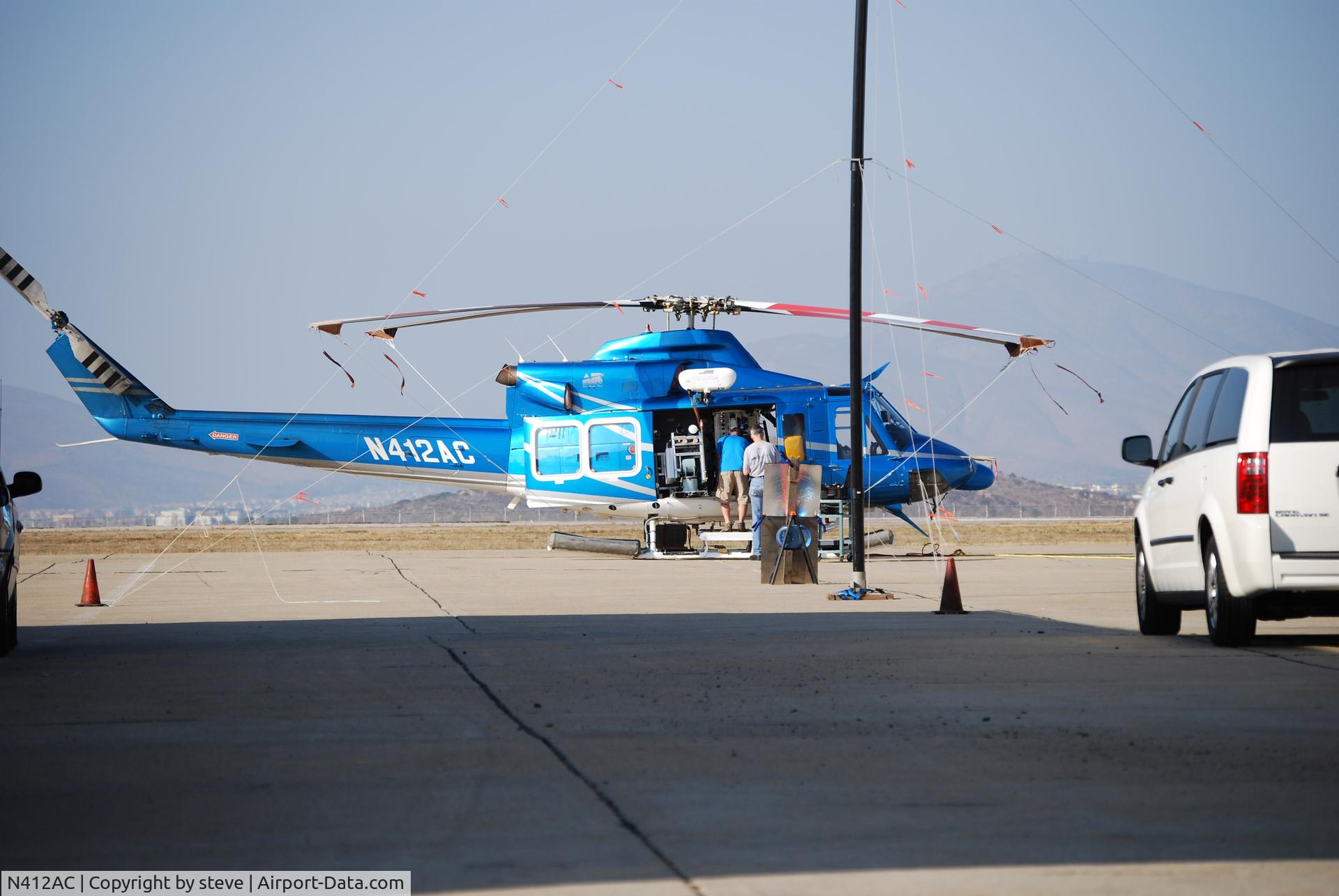 N412AC, 2003 Bell 412EP C/N 36320, what are you guys doing