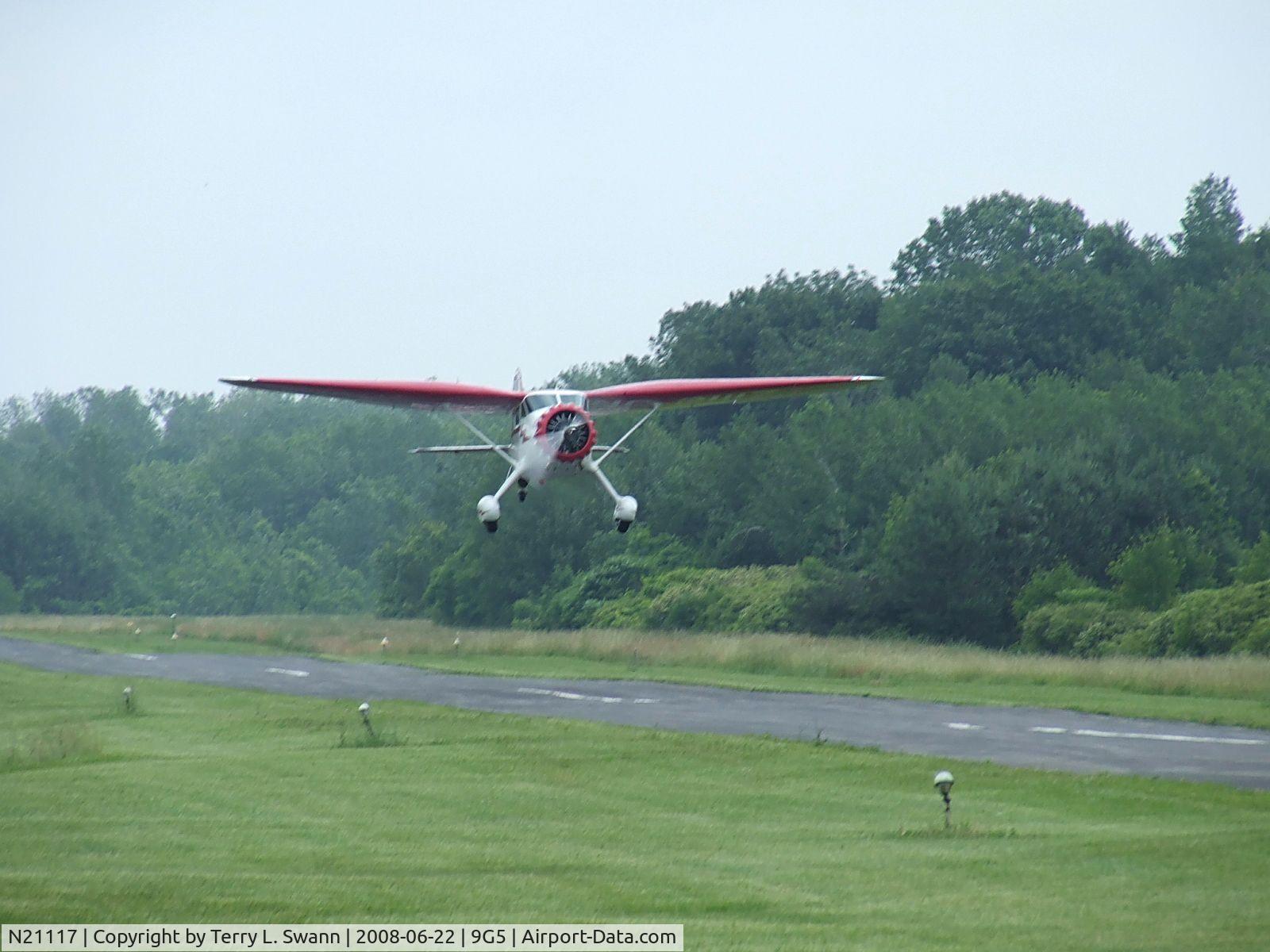 N21117, 1939 Stinson SR-9C Reliant C/N 5371, Taking off at Royalton after having breakfast.