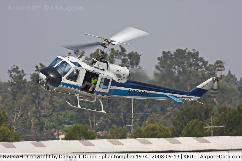 N204AH, 1985 Bell 204B C/N 2030, Taken at Fullerton Airport open house.  Was not part of it but arrived during it.