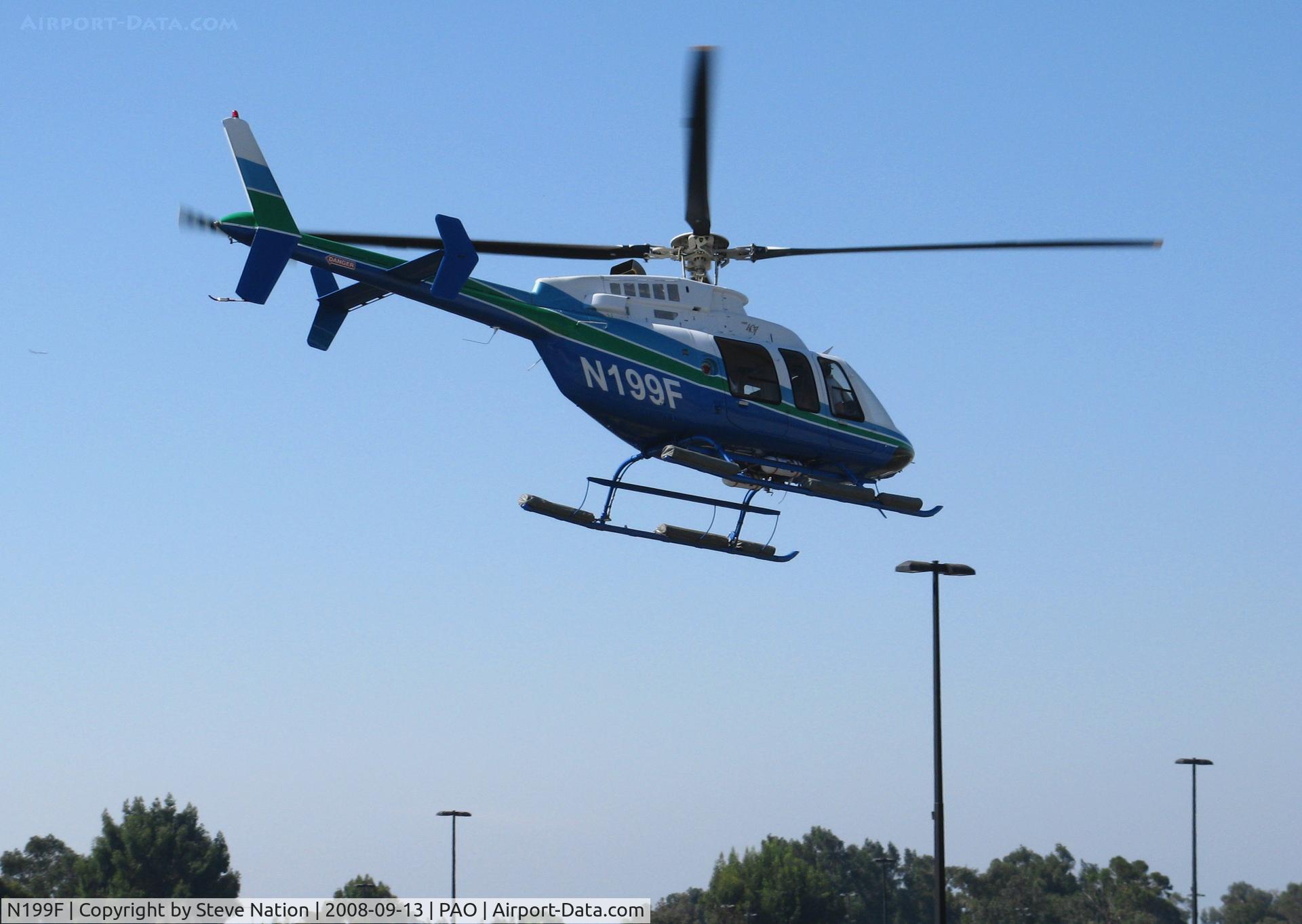 N199F, 2003 Bell 407 C/N 53574, 2003 Bell 407 banking away @ Palo Alto, CA