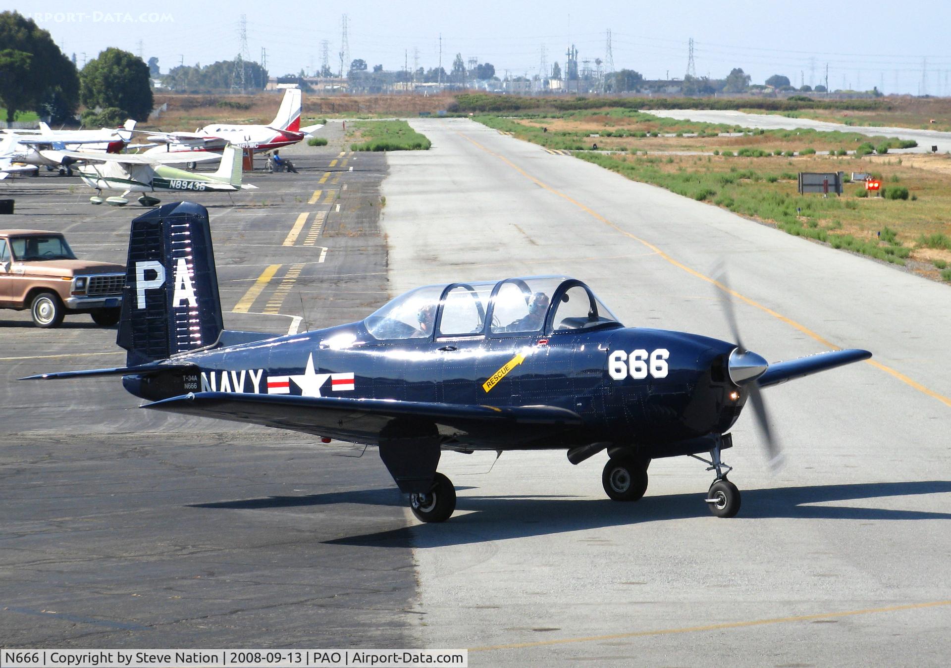 N666, 1958 Beech A45 C/N GM-141, Beech T-34A PA-666 as Navy taxying @ Palo Alto, CA