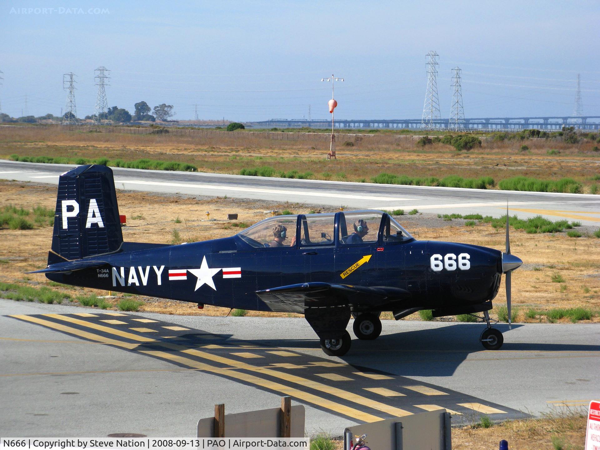 N666, 1958 Beech A45 C/N GM-141, Beech T-34A PA-666 as Navy taxying @ Palo Alto, CA