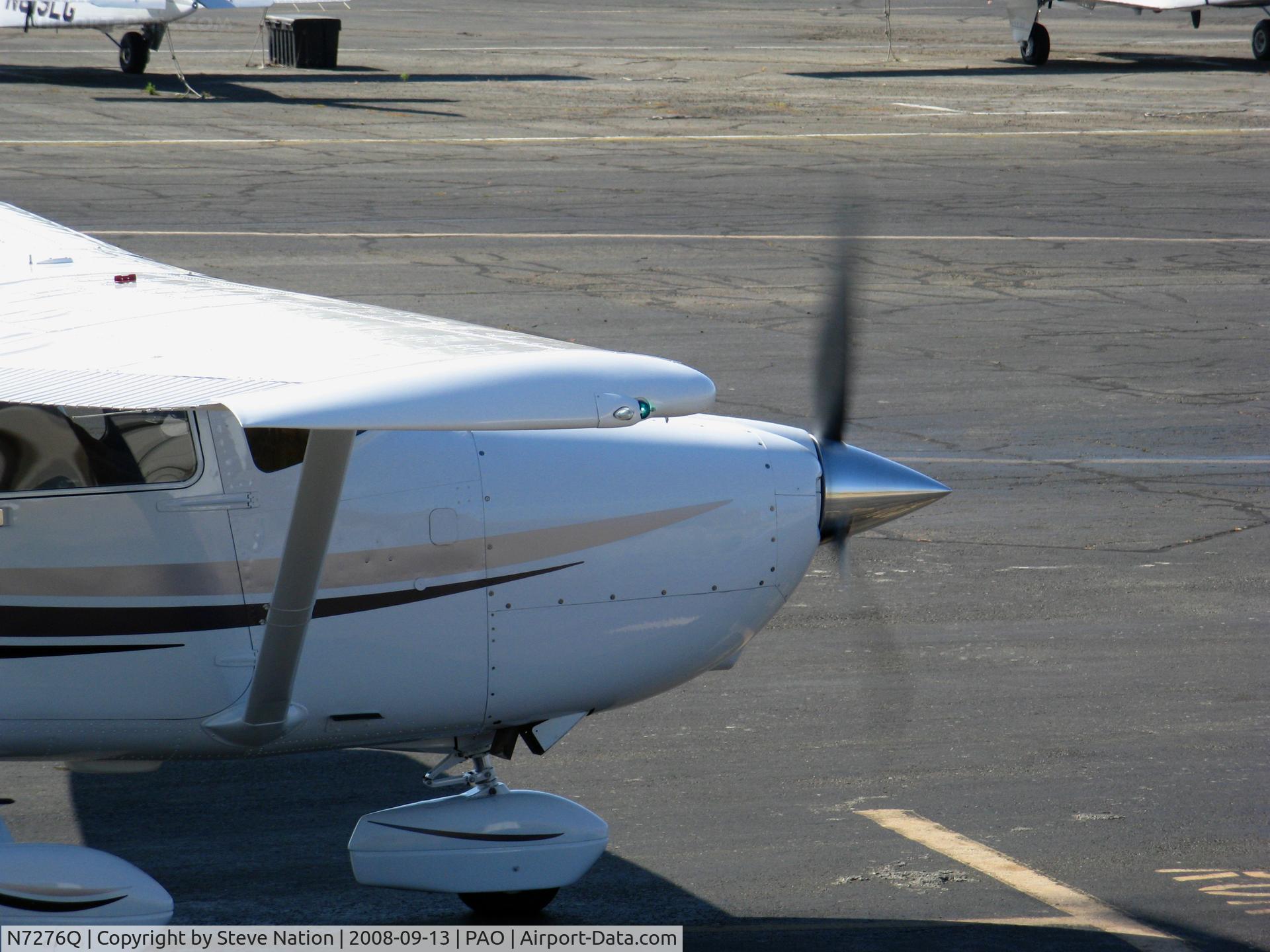N7276Q, 1999 Cessna 182S Skylane C/N 18280567, Close-up of engine running up on 1999 Cessna 182S holding by tower @ Palo Alto, CA