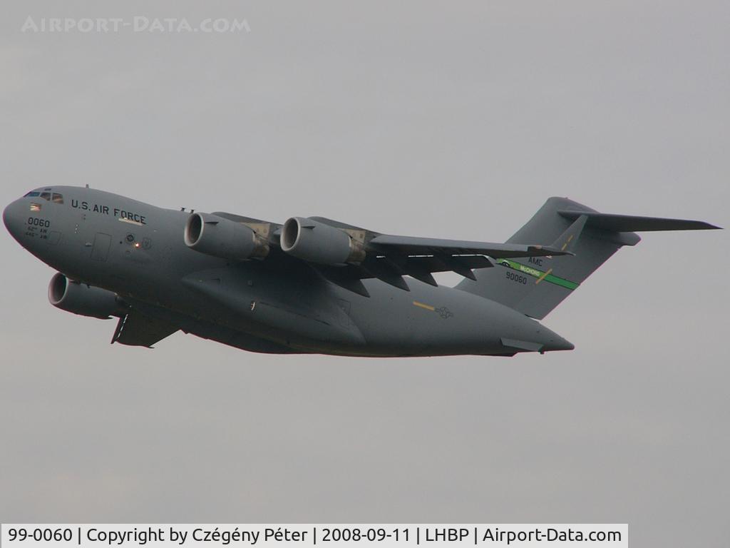 99-0060, 1999 Boeing C-17A Globemaster III C/N 50064/P-60, Climbing out from rwy 31L.