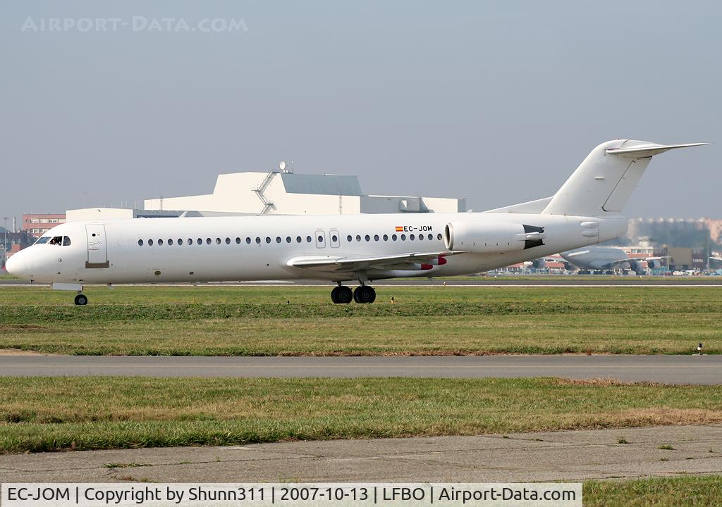 EC-JOM, 1994 Fokker 100 (F-28-0100) C/N 11498, Rolling holding point rwy 32R for departure... Now on history