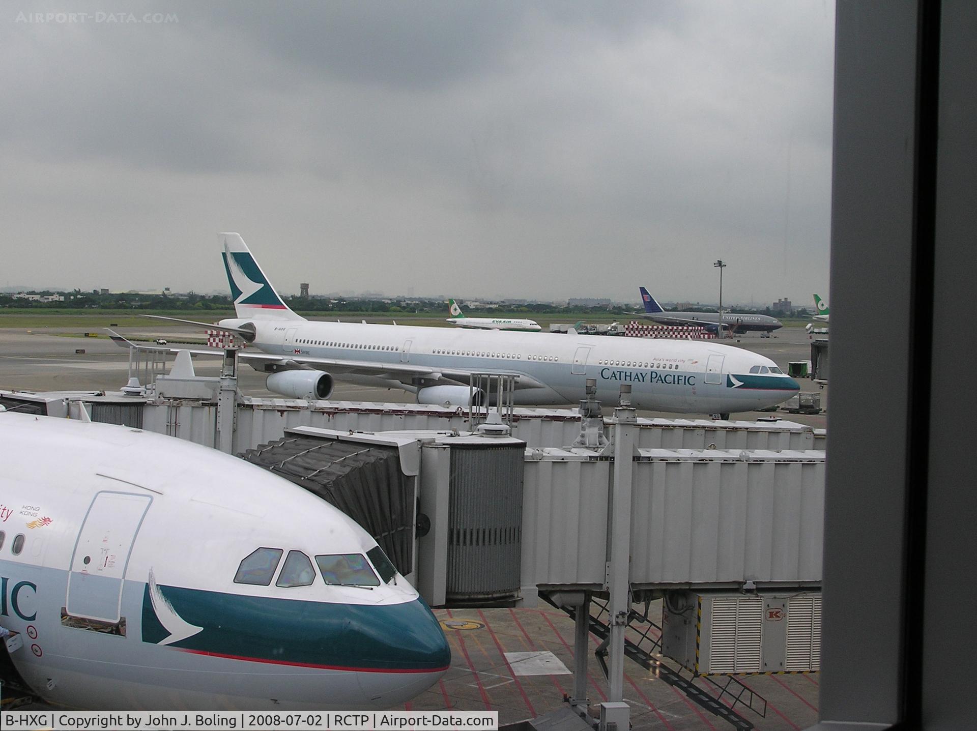 B-HXG, 1998 Airbus A340-313 C/N 208, A340 at gate in Taipei