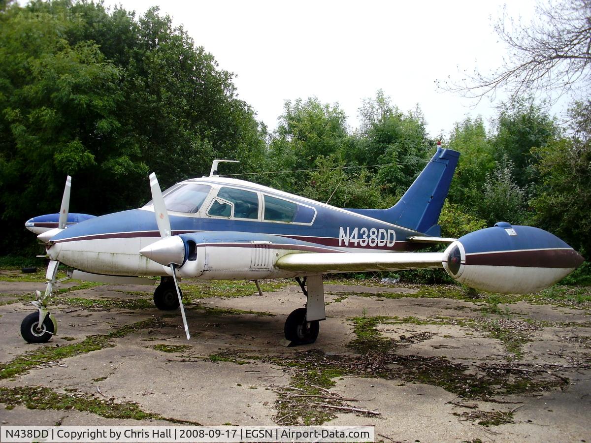 N438DD, 1960 Cessna 310D C/N 39278, Stored in a corner at Bourn