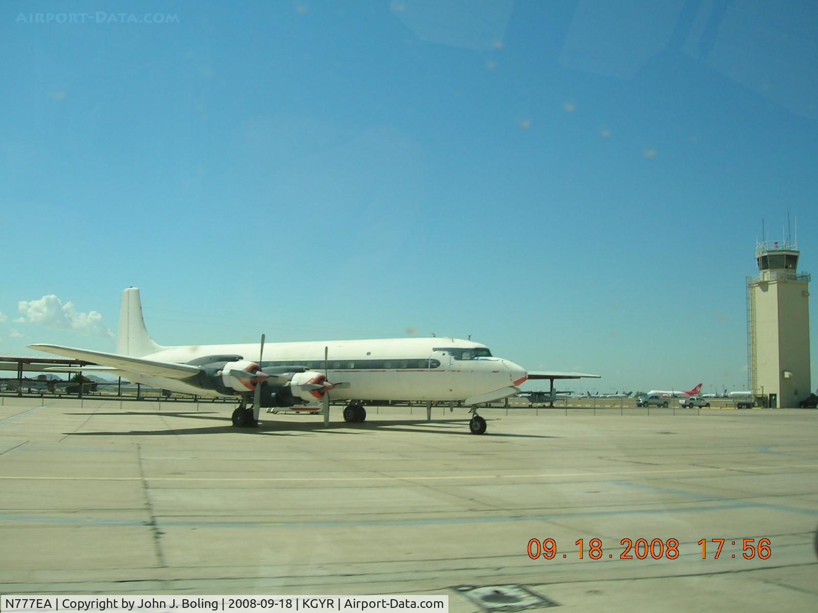 N777EA, 1958 Douglas DC-7C Seven Seas Seven Seas C/N 45549, Classic DC-7 on ramp at Goodyear Airport