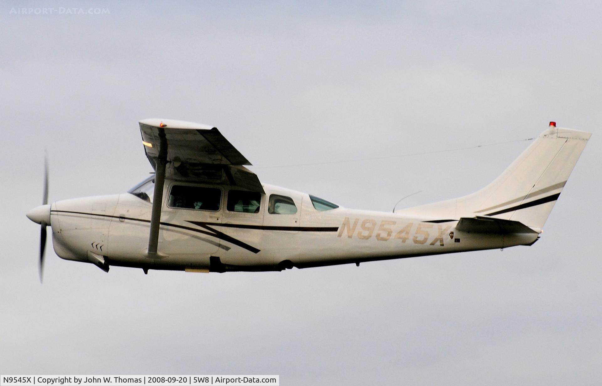 N9545X, 1961 Cessna 210B C/N 21057845, Departing runway 4