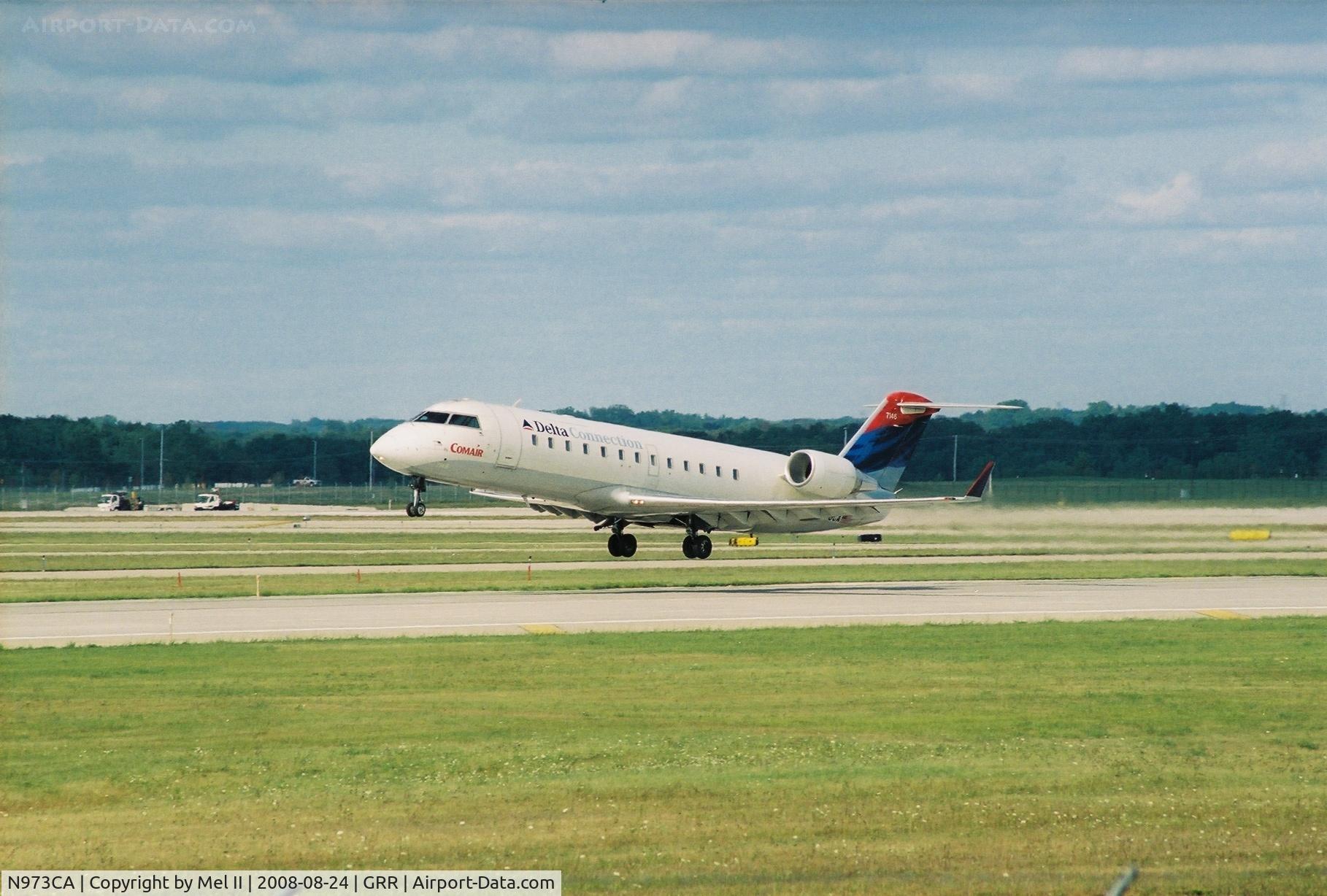 N973CA, 1996 Canadair CL-600-2B19 Regional Jet CRJ-100ER C/N 7146, COM604 - GRR-CVG - Departing RWY 26L