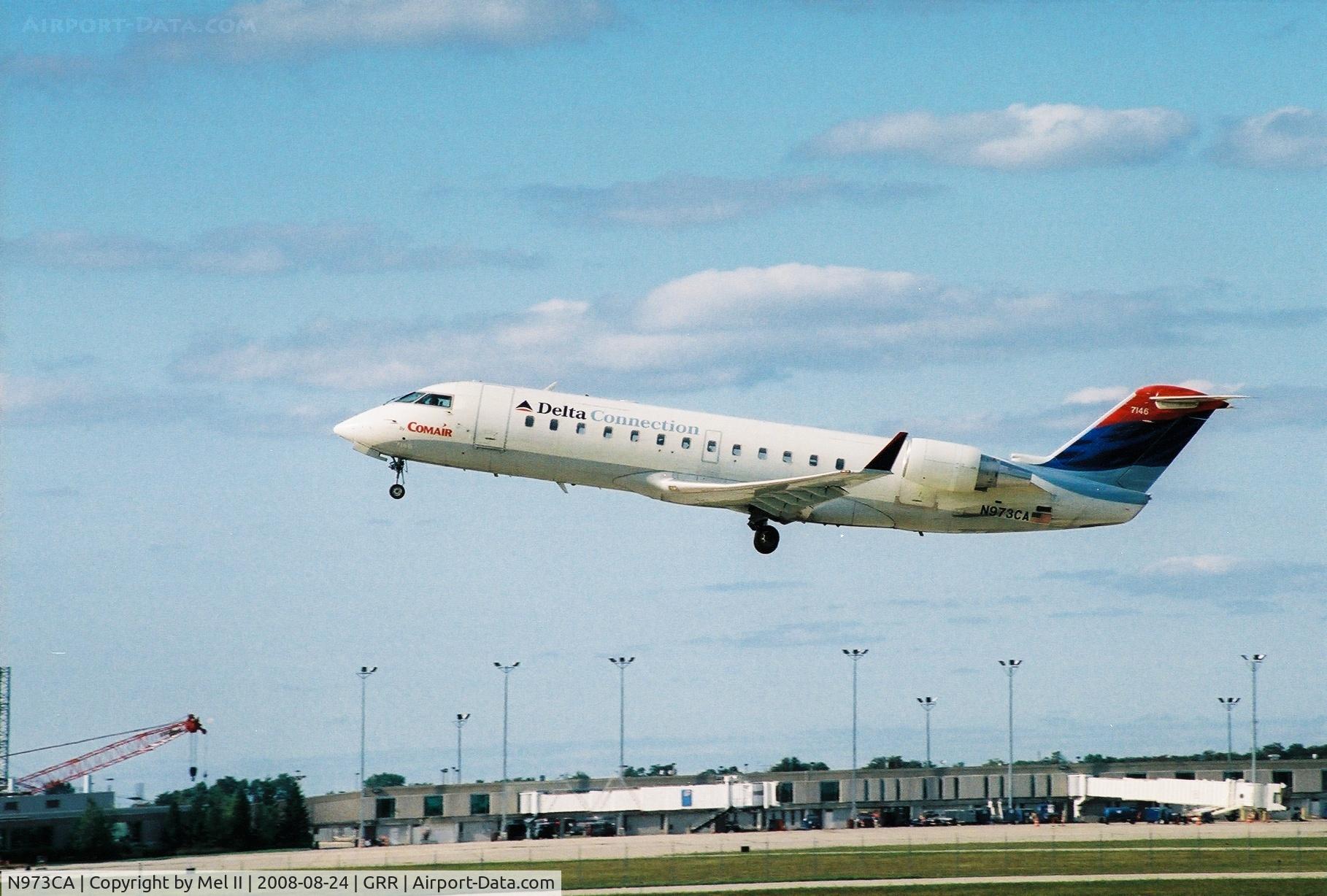N973CA, 1996 Canadair CL-600-2B19 Regional Jet CRJ-100ER C/N 7146, COM604 - GRR-CVG - Departing RWY 26L