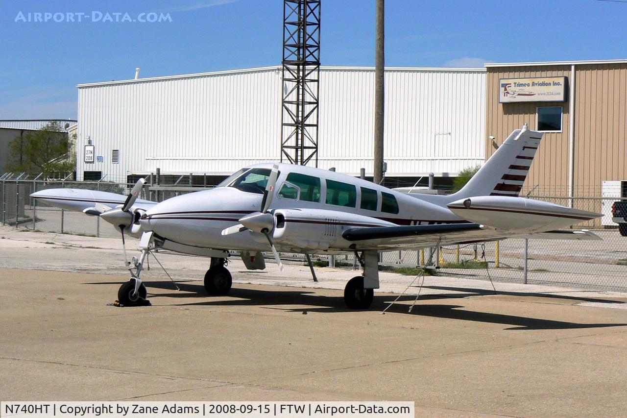 N740HT, 1964 Cessna 320C Skyknight C/N 320C0038, At Meacham Field - Prop damage on right side