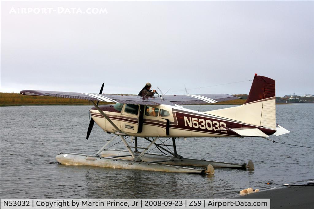 N53032, 1974 Cessna A185F Skywagon 185 C/N 18502326, Refueling on the Kuskokwim River