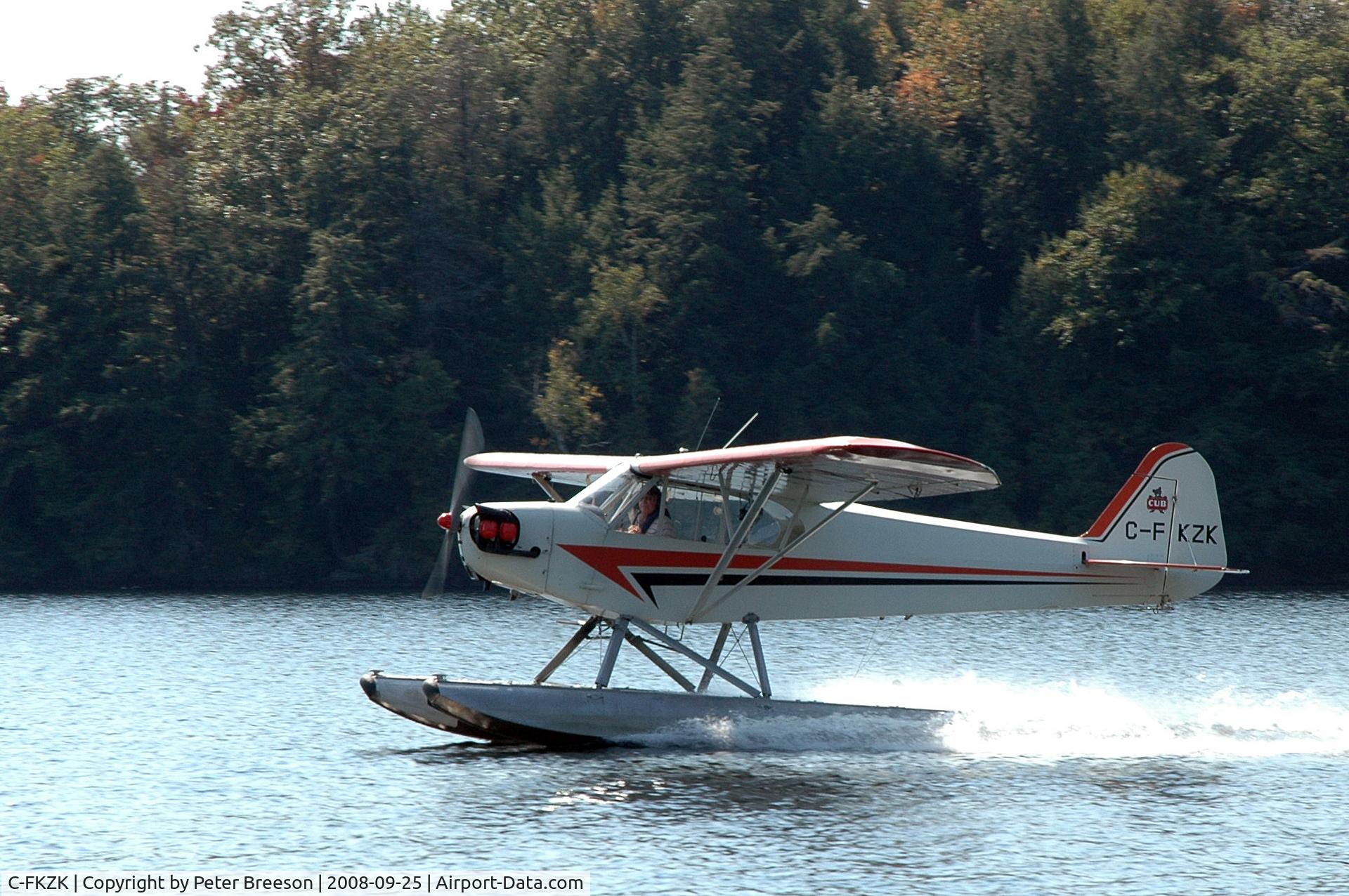 C-FKZK, 1947 Piper J3C-65 Cub Cub C/N 22983, C-FKZK Landing on Lake Muskoka