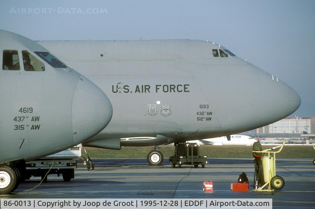 86-0013, 1986 Lockheed C-5B Galaxy C/N 500-0099, C-5B 86-0013 together with C-141B 64-0619 on the ramp Rhein Main AB during the build up of American Forces in Hungary during the Balkan crisis.