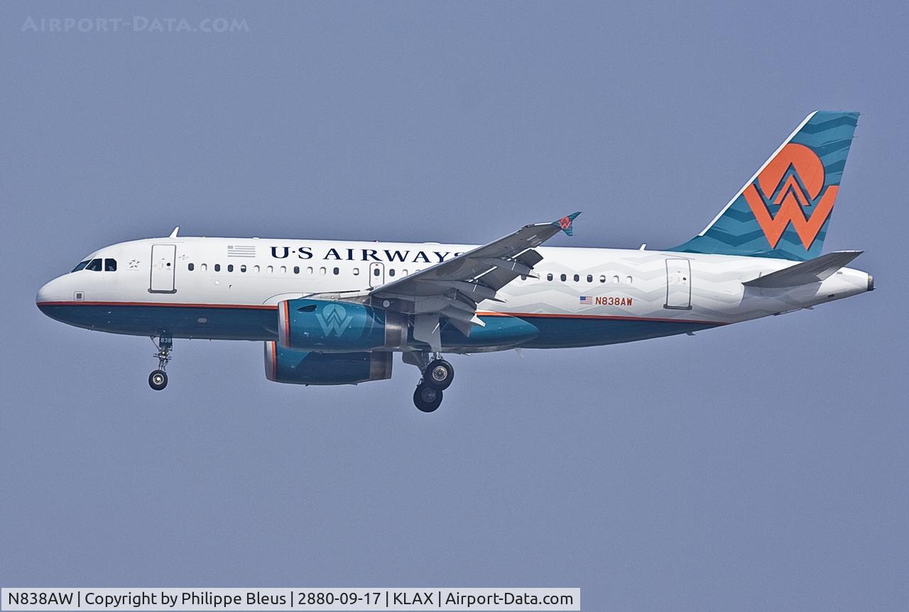 N838AW, 2005 Airbus A319-132 C/N 2615, Hybrid title/livery on short final rwy 24R at KLAX