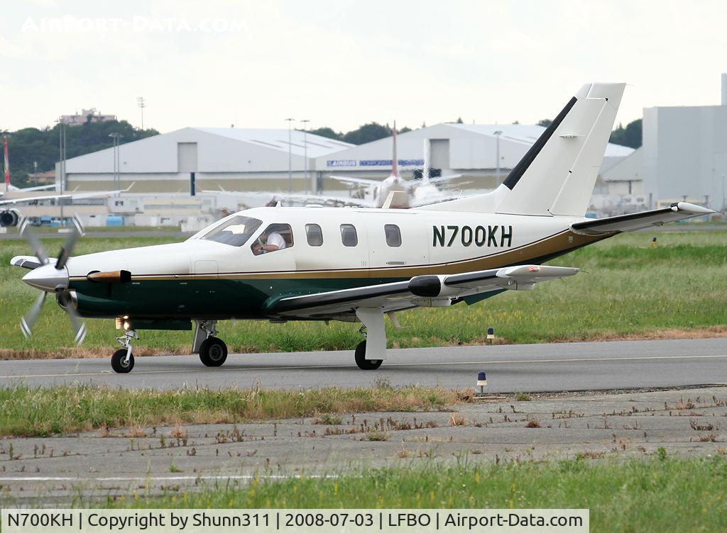 N700KH, 2002 Socata TBM-700 C/N 210, Rolling holding point rwy 32R for departure...