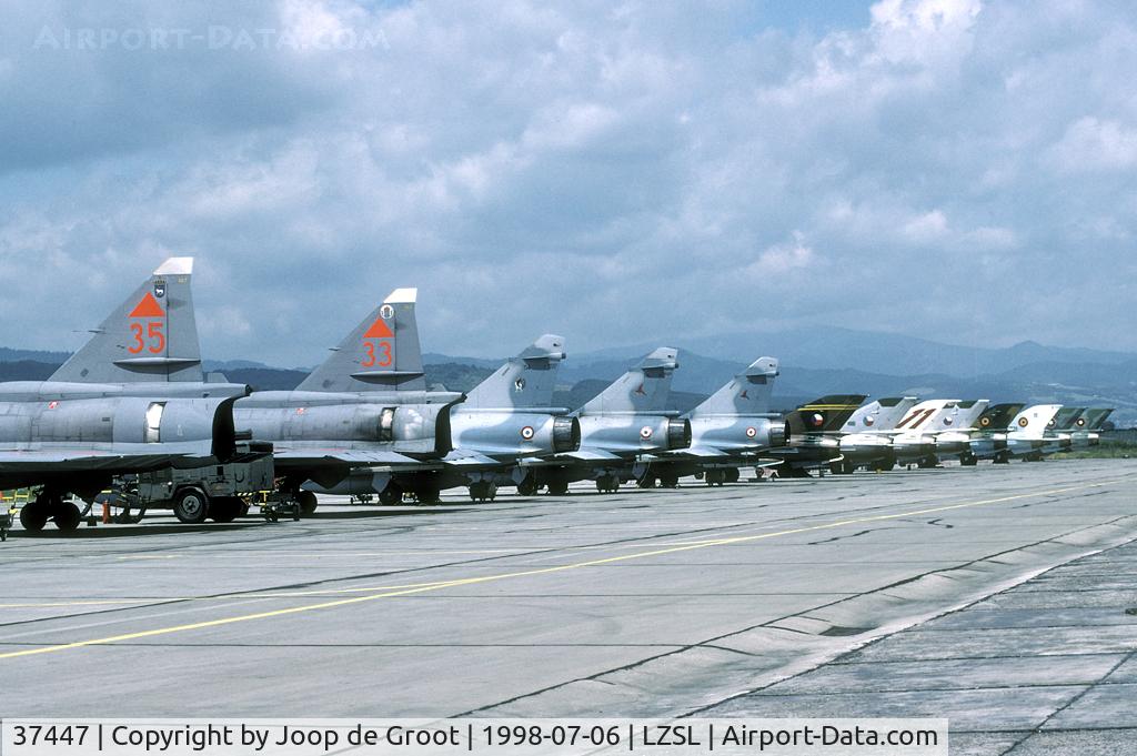 37447, Saab JA 37D Viggen C/N 37447, A wide array of fighters was present during Co-operative Key 1998. Behind the Viggens there are three French Mirage 2000C, four Czech MiG-21, two Rumanian MiG-21 and two Bulgarian MiG-21.