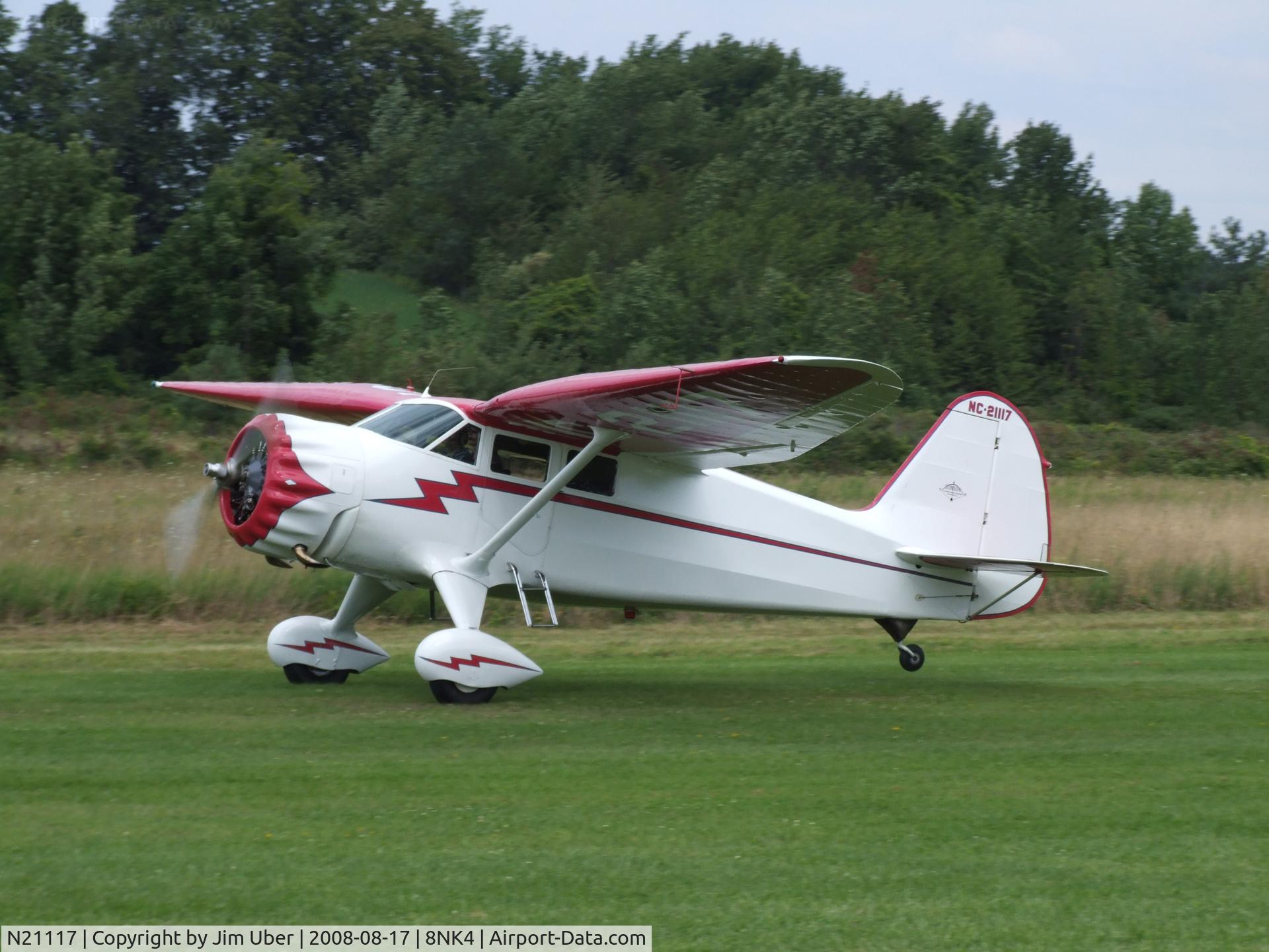 N21117, 1939 Stinson SR-9C Reliant C/N 5371, Just departing Bethany 