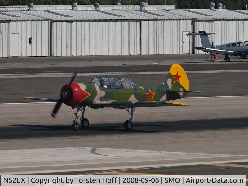 N52EX, 1988 Yakovlev (Aerostar) Yak-52 C/N 888407, N52EX departing on RWY 21