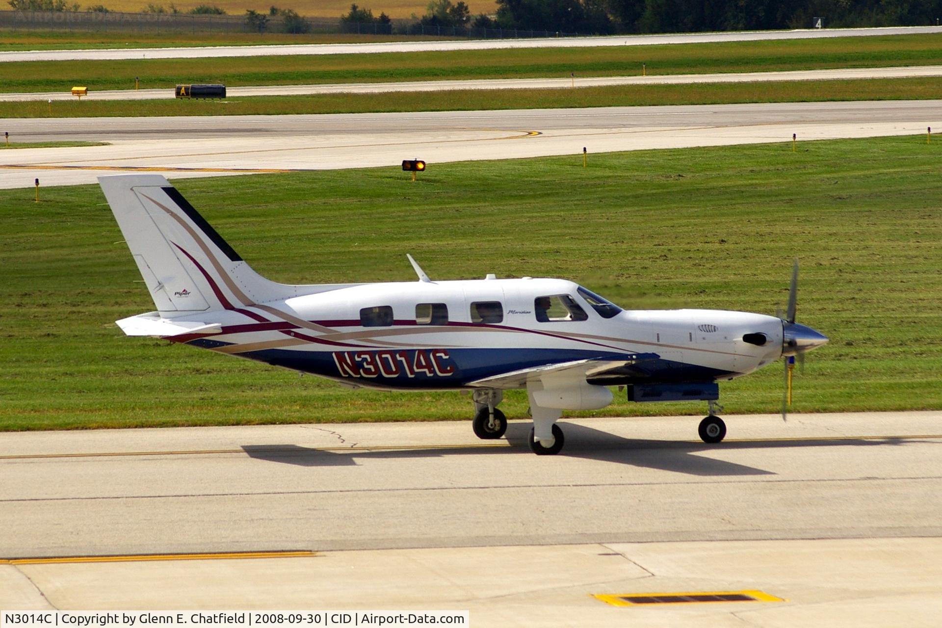 N3014C, 2007 Piper PA-46-500TP C/N 4697311, Taxiing to Landmark FBO, as seen from my office window.