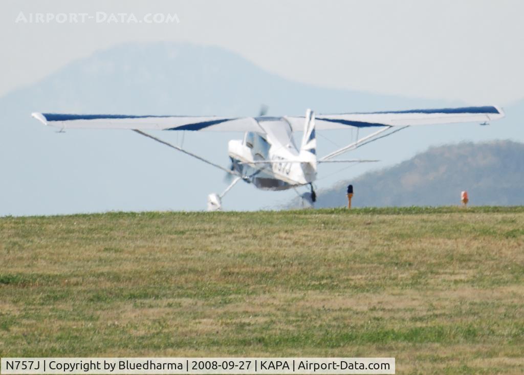N757J, American Champion 7GCAA Citabria C/N 512-2007, Landing on 17L with Pikes Peak in the Distance.