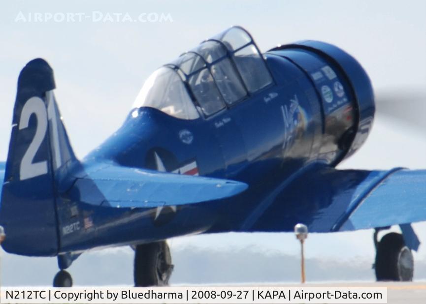 N212TC, 1944 North American SNJ-5 Texan Texan C/N 121-41732, Mystical Power prepares to takeoff on 17L with fellow photographer John Little.