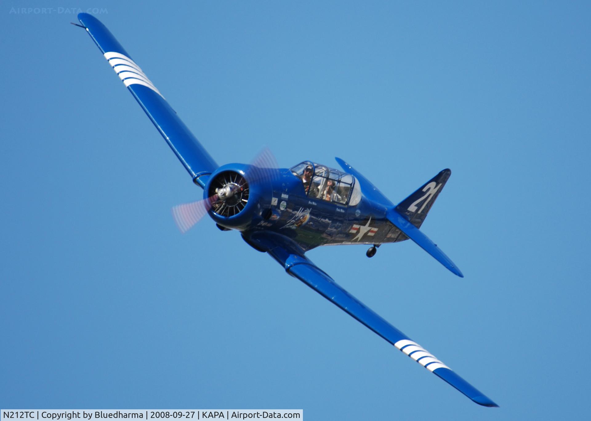 N212TC, 1944 North American SNJ-5 Texan Texan C/N 121-41732, Mystical Power does a high speed pass with fellow photographer John Little.