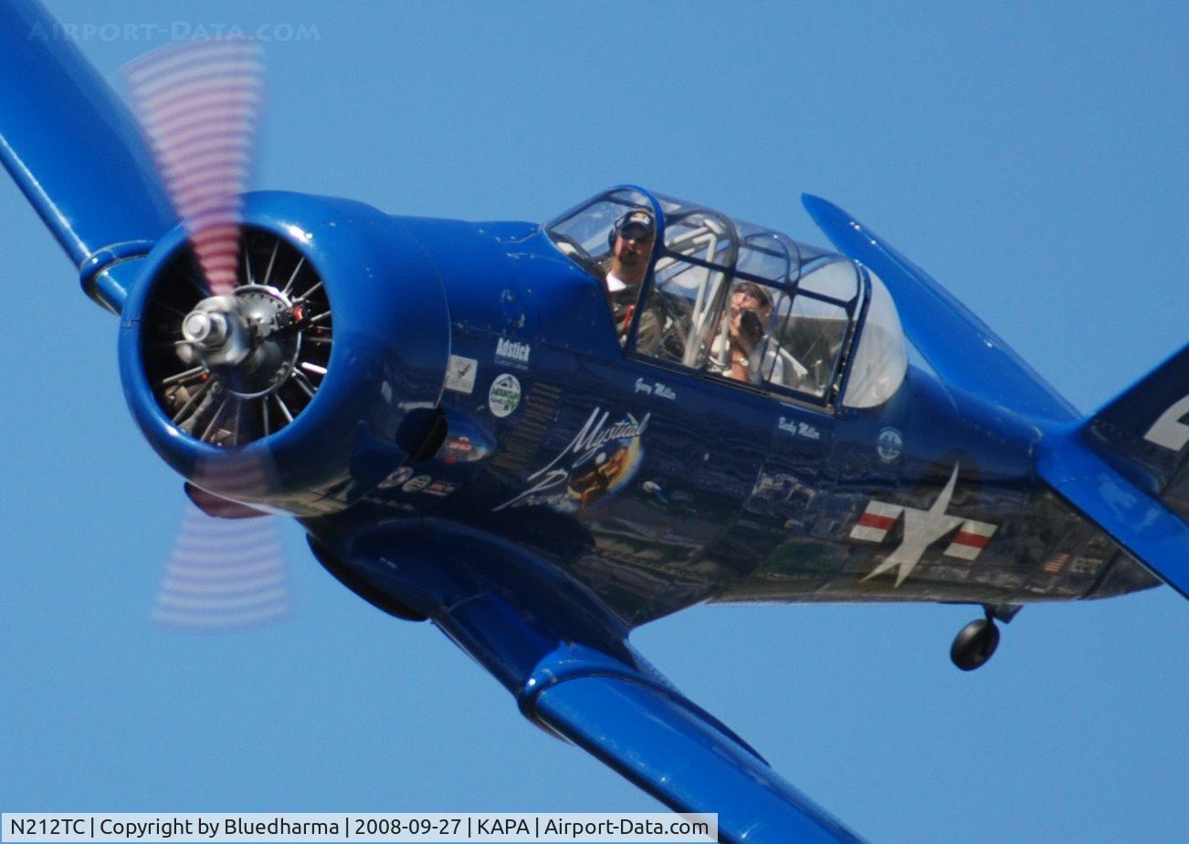 N212TC, 1944 North American SNJ-5 Texan Texan C/N 121-41732, Mystical Power does a high speed pass with fellow photographer John Little.