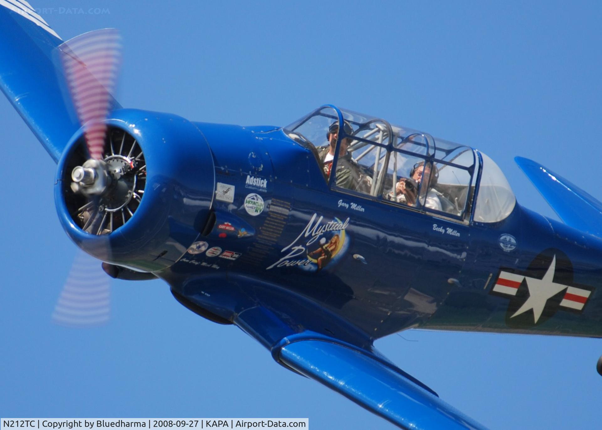 N212TC, 1944 North American SNJ-5 Texan Texan C/N 121-41732, Mystical Power does a high speed pass with fellow photographer John Little.