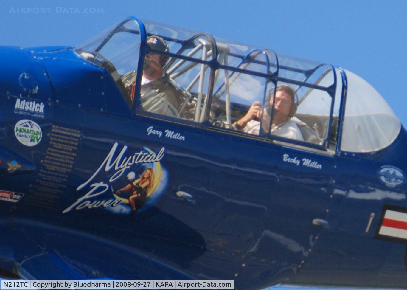 N212TC, 1944 North American SNJ-5 Texan Texan C/N 121-41732, Mystical Power does a high speed pass with fellow photographer John Little.