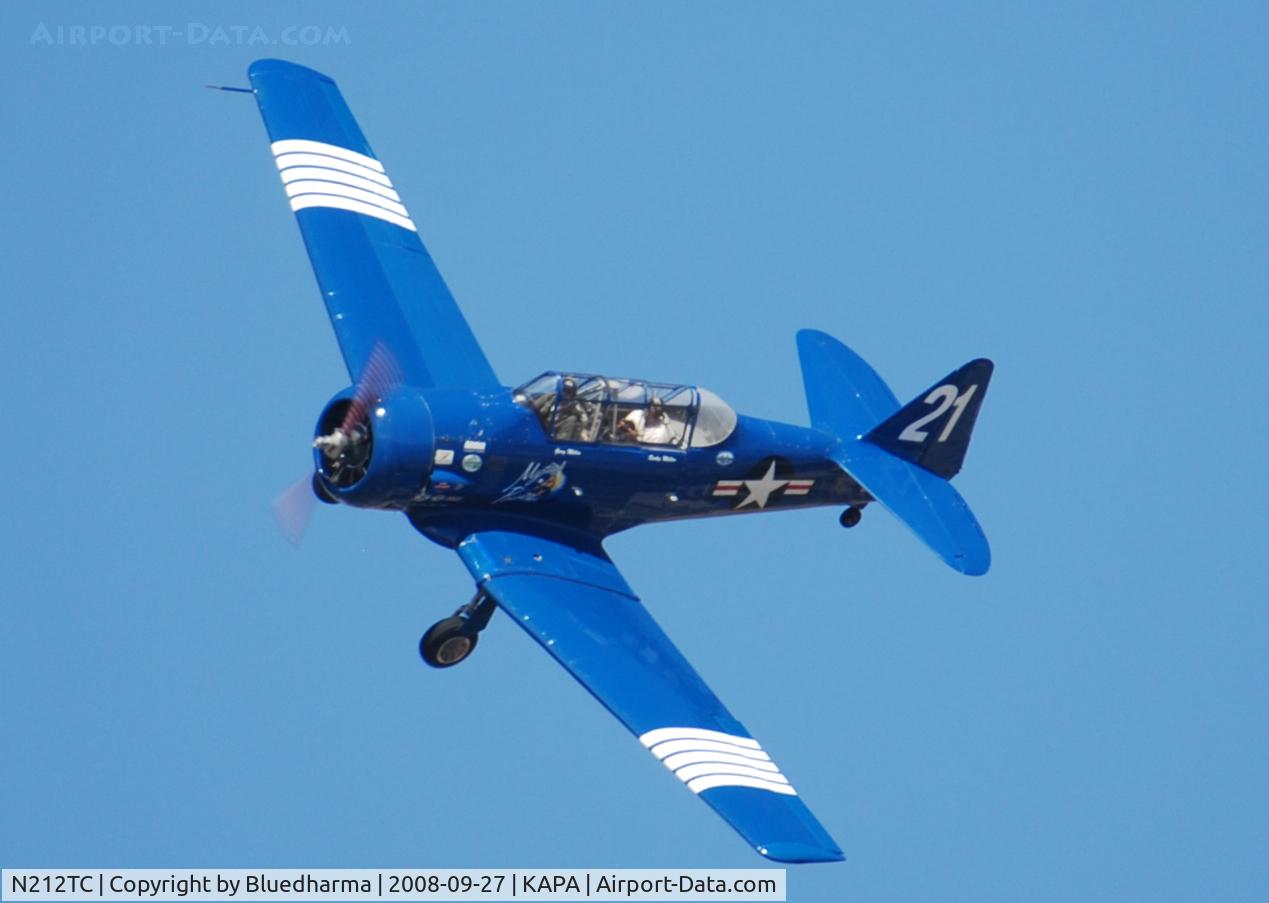 N212TC, 1944 North American SNJ-5 Texan Texan C/N 121-41732, Mystical Power on final approach to 17L with fellow photographer John Little.