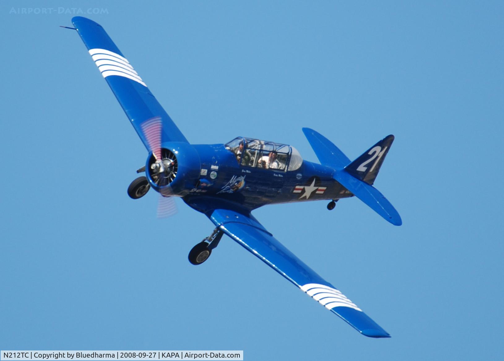 N212TC, 1944 North American SNJ-5 Texan Texan C/N 121-41732, Mystical Power on final approach to 17L with fellow photographer John Little.