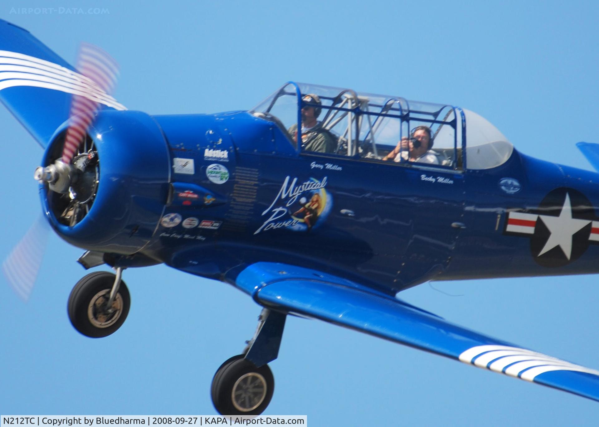 N212TC, 1944 North American SNJ-5 Texan Texan C/N 121-41732, Mystical Power on final approach to 17L with fellow photographer John Little.