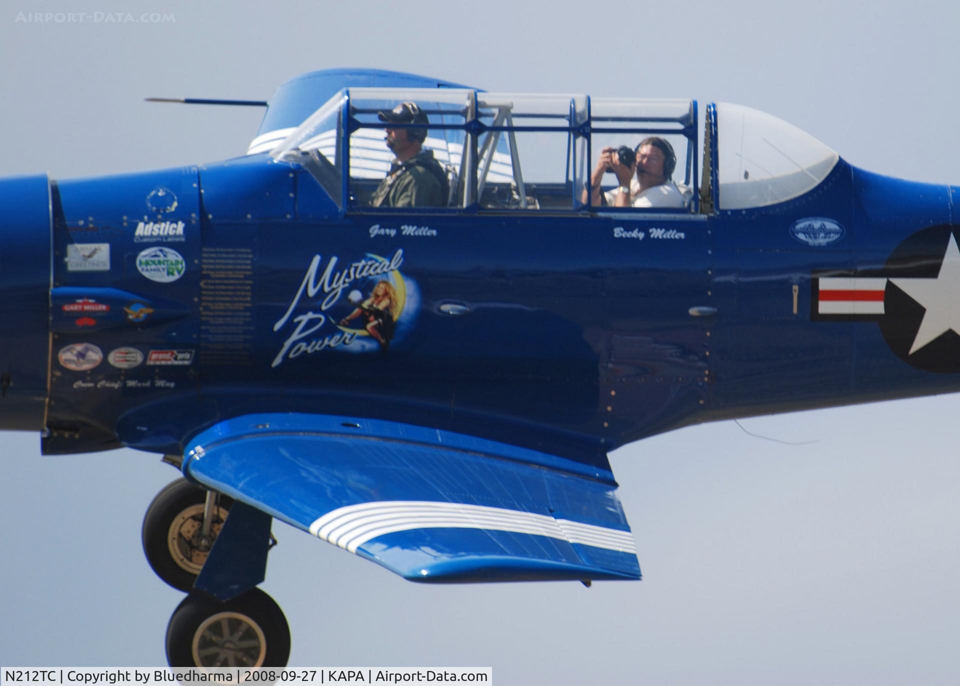 N212TC, 1944 North American SNJ-5 Texan Texan C/N 121-41732, Mystical Power on final approach to 17L with fellow photographer John Little.