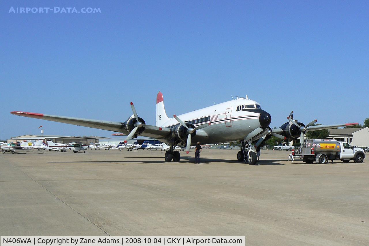 N406WA, Douglas C-54G (DC4-ME2) Skymaster C/N DO338, In for a short fuel stop at Arlington Municipal during a cross country trip from Reno to Miami. USAAF SN  45-0491