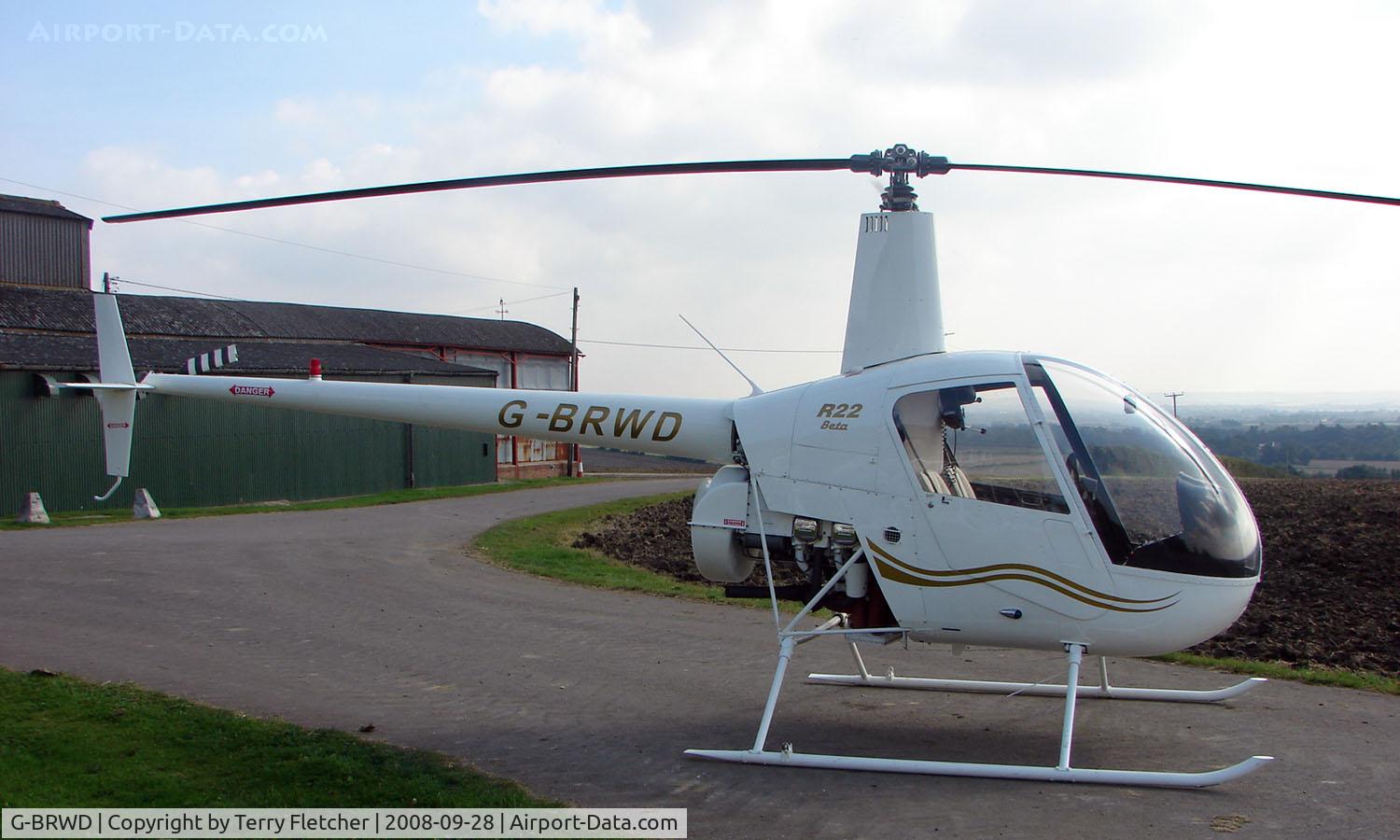 G-BRWD, 1989 Robinson R22 Beta C/N 1231, a1989 Robinson R22 at a quiet Cambridgeshire  airfield